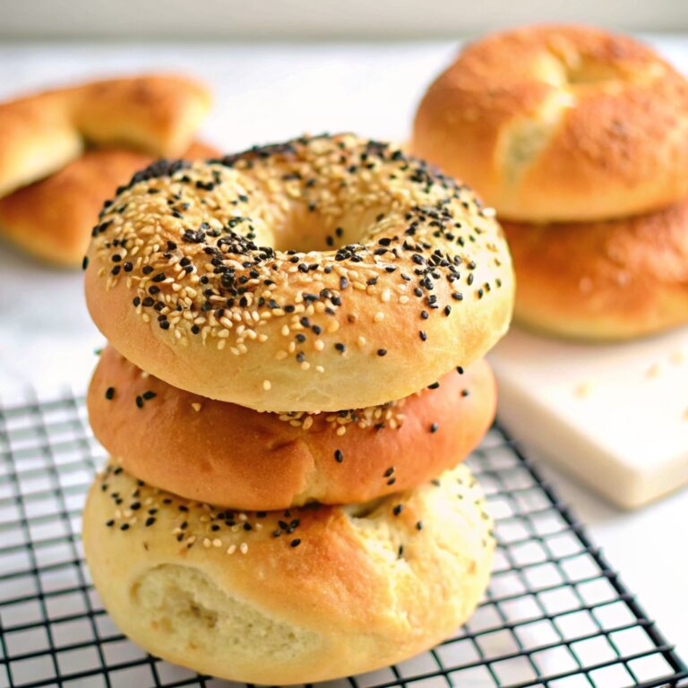 A perfect, golden-brown two ingredient high protein bagel ready to be eaten.